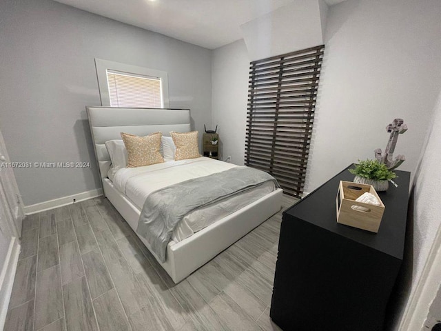 bedroom featuring light wood-type flooring