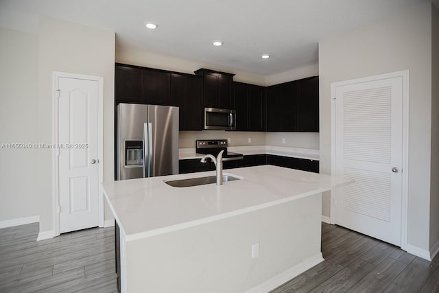 full bathroom featuring vanity, tub / shower combination, hardwood / wood-style floors, and toilet