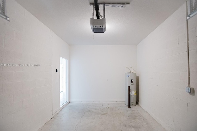 garage with a garage door opener and electric water heater