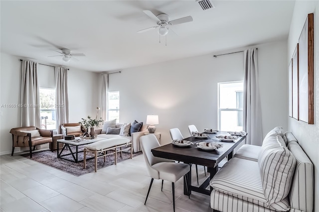 dining area featuring visible vents and a ceiling fan