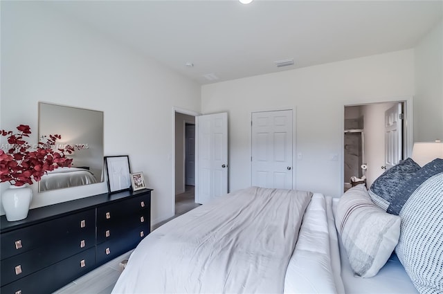 bedroom with visible vents