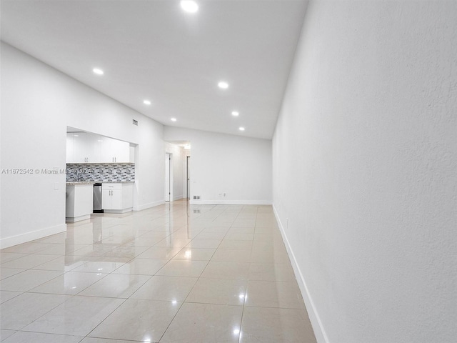 empty room with light tile patterned floors