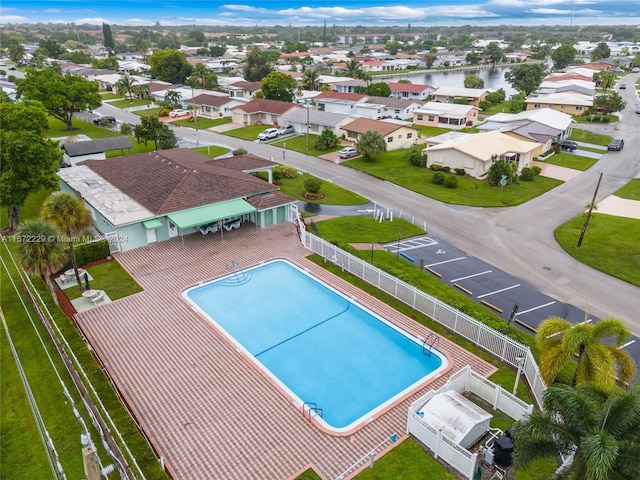 view of swimming pool with a water view