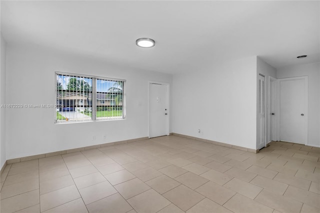 view of tiled spare room