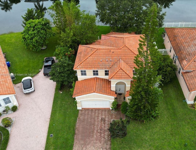 bird's eye view with a water view