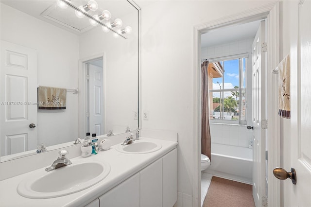 full bathroom featuring vanity, toilet, tile patterned floors, and shower / bath combination with curtain