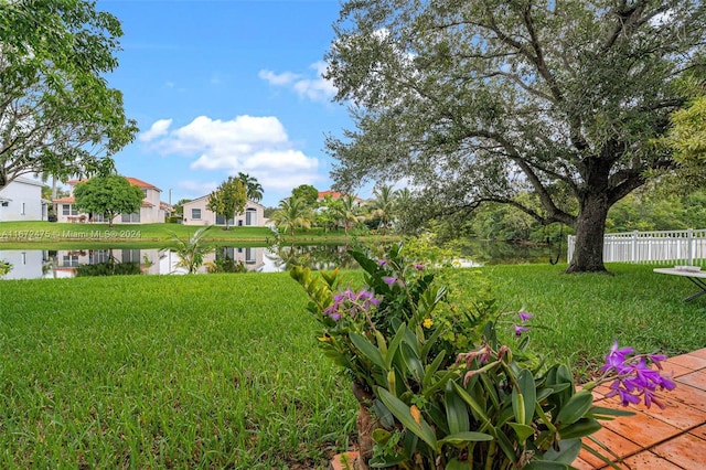 view of yard with a water view