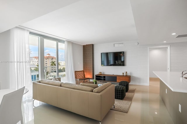 living room featuring light tile patterned floors