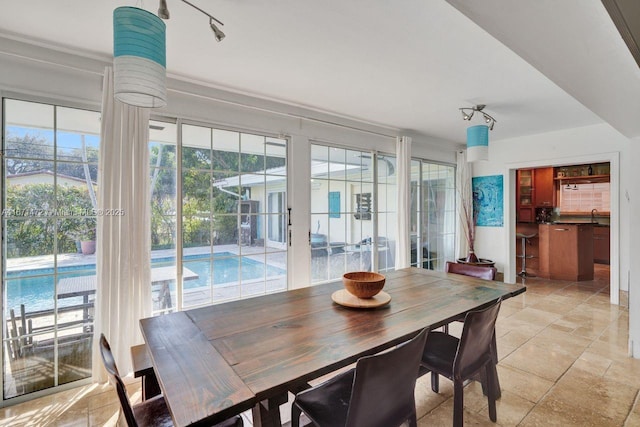 dining space featuring sink