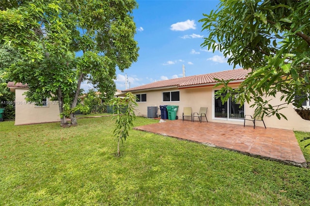 exterior space featuring a patio and central AC