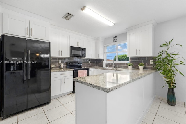 kitchen featuring decorative backsplash, black appliances, kitchen peninsula, and white cabinetry