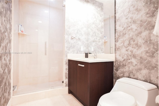 bathroom with walk in shower, tile patterned flooring, vanity, and toilet