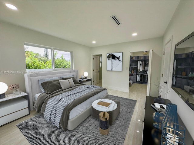 bedroom featuring light hardwood / wood-style flooring