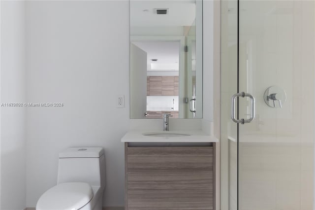 121 NE 34th St Unit 2806A, Miami, FL 33137 - full bath with toilet, vanity, visible vents, and a stall shower