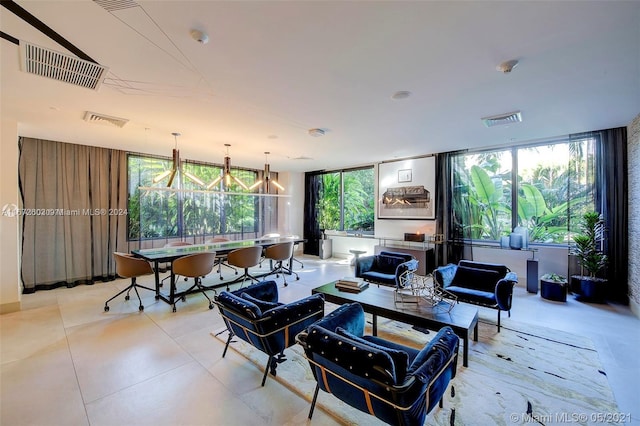 living room featuring a notable chandelier