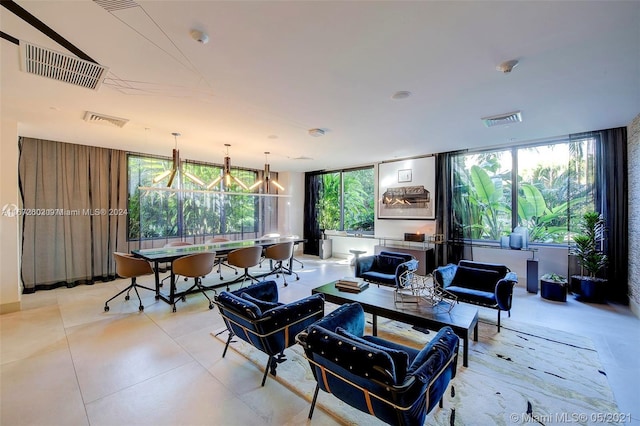 121 NE 34th St Unit 2806A, Miami, FL 33137 - living area featuring visible vents and plenty of natural light