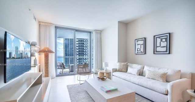 4111 S Ocean Dr Unit 3007, Hollywood, FL 33019 - tiled living area with a wall of windows
