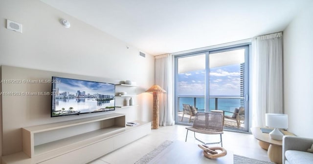 4111 S Ocean Dr Unit 3007, Hollywood, FL 33019 - living area featuring a wall of windows and visible vents