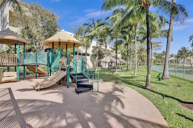 view of play area featuring a lawn