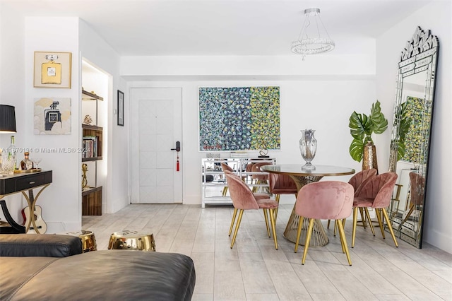 dining space featuring light hardwood / wood-style flooring