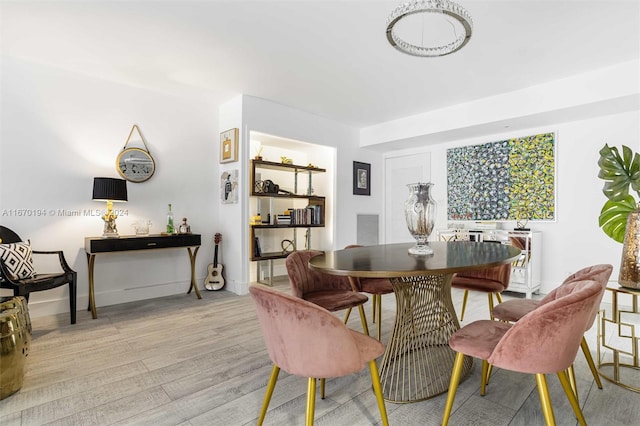 dining room with light wood-type flooring