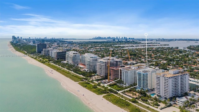 aerial view featuring a water view and a view of the beach