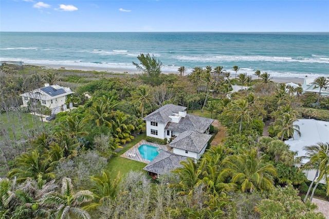 aerial view with a view of the beach and a water view