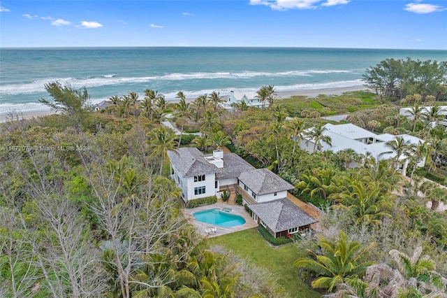 bird's eye view featuring a beach view and a water view