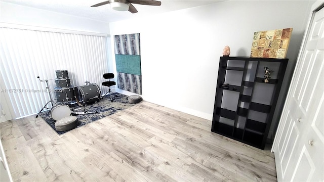 misc room featuring ceiling fan and light hardwood / wood-style floors