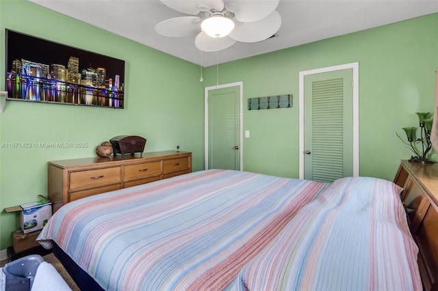 bedroom with a closet and ceiling fan