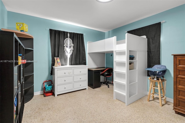 bedroom with baseboards