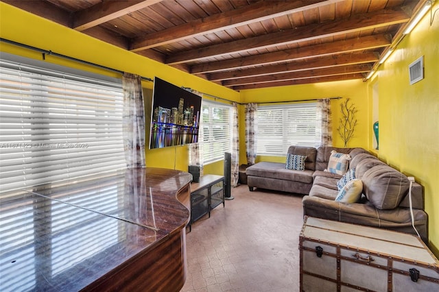 living room with tile patterned floors, beamed ceiling, and wooden ceiling