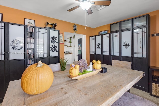 dining room featuring a ceiling fan