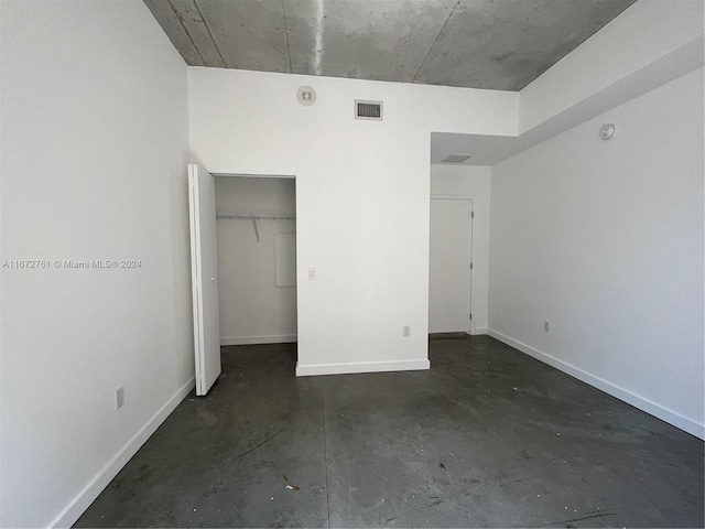 unfurnished bedroom with a closet