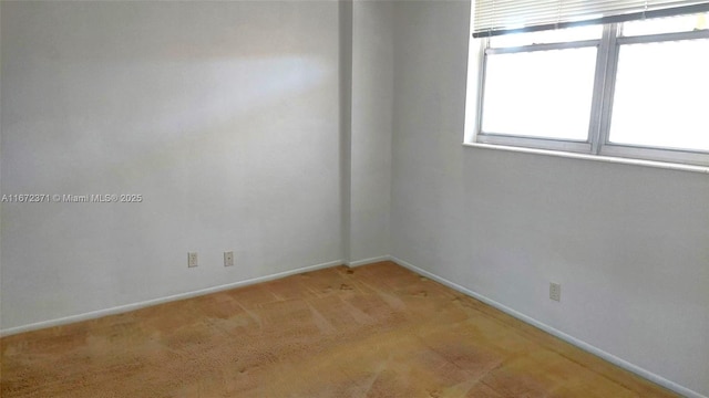 view of carpeted spare room