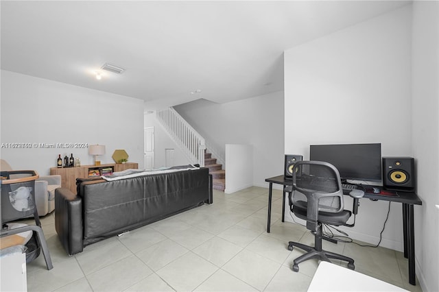 office area with light tile patterned flooring