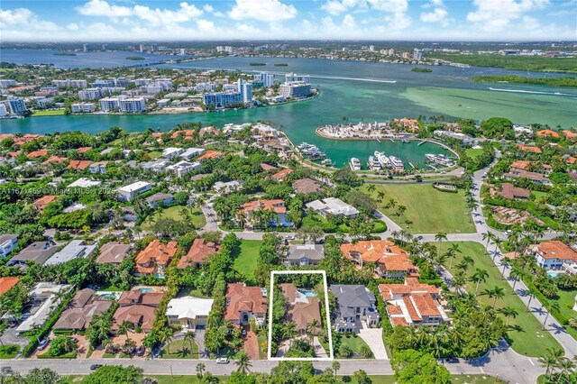 birds eye view of property featuring a water view