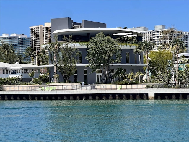 view of pool featuring a water view