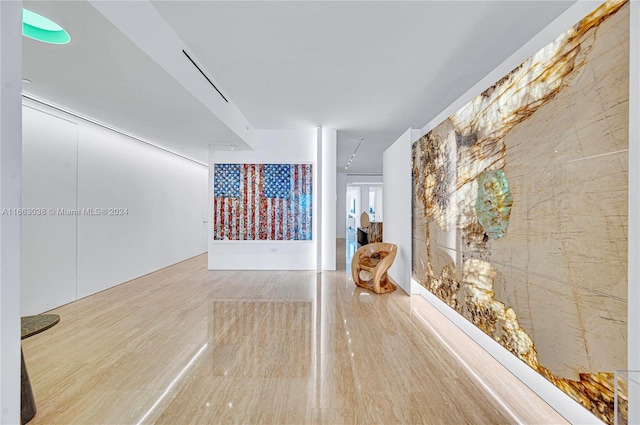 hallway featuring hardwood / wood-style flooring