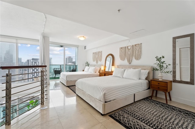 bedroom featuring floor to ceiling windows, light tile patterned flooring, and access to outside