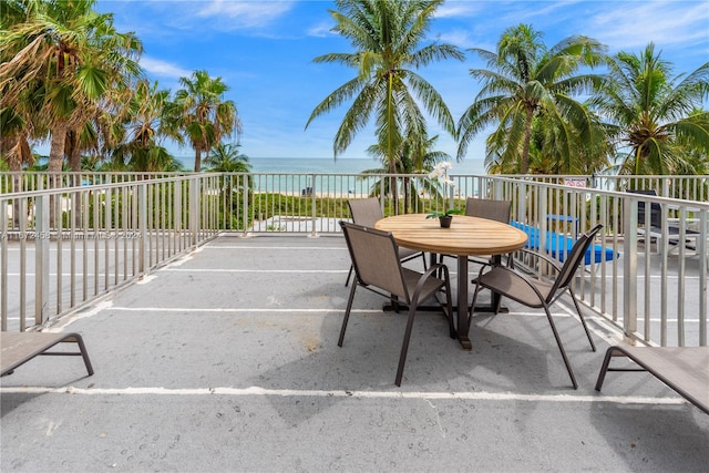 view of patio featuring a water view