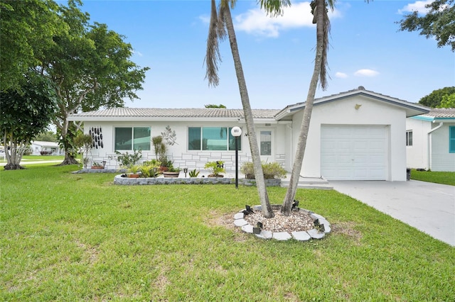 ranch-style house with a garage and a front lawn