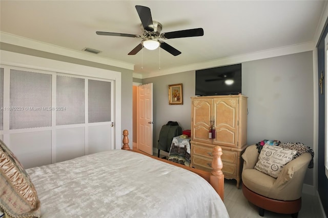 bedroom featuring ornamental molding and ceiling fan