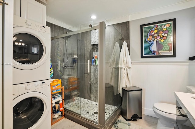 bathroom featuring vanity, ornamental molding, walk in shower, toilet, and decorative backsplash