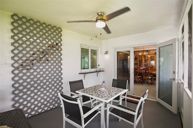 sunroom / solarium with ceiling fan