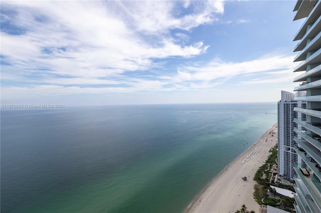 property view of water featuring a beach view