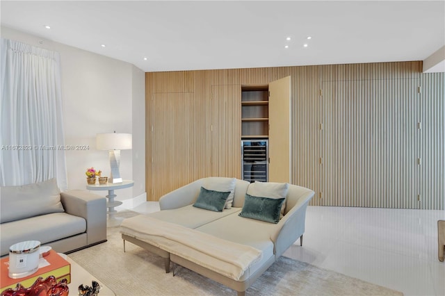 living area with recessed lighting and wine cooler