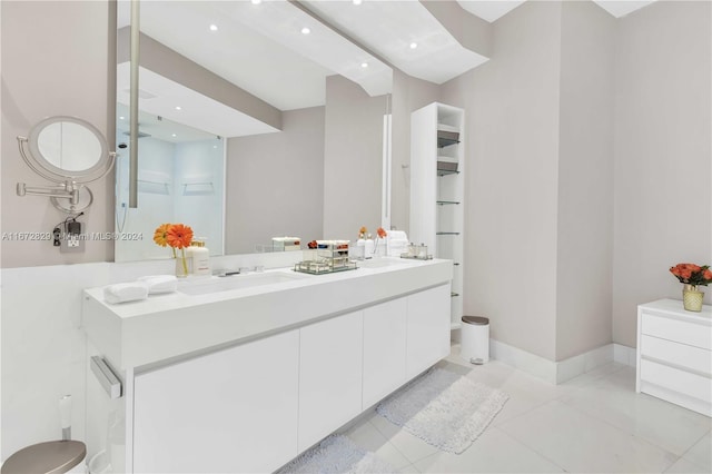 full bath featuring vanity, tile patterned floors, and recessed lighting