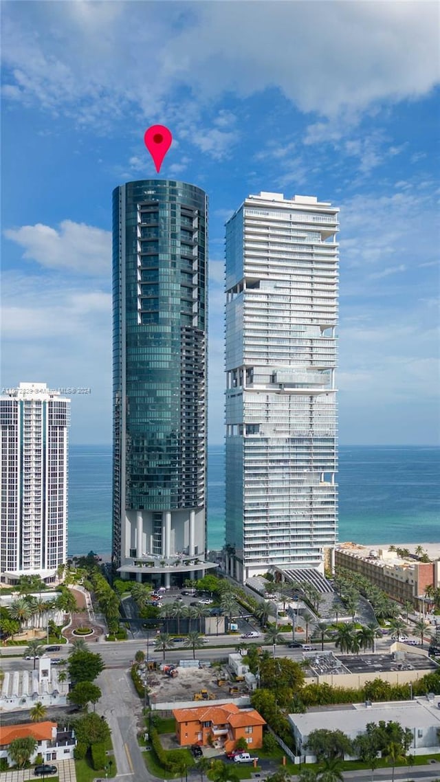 view of urban area with a large body of water