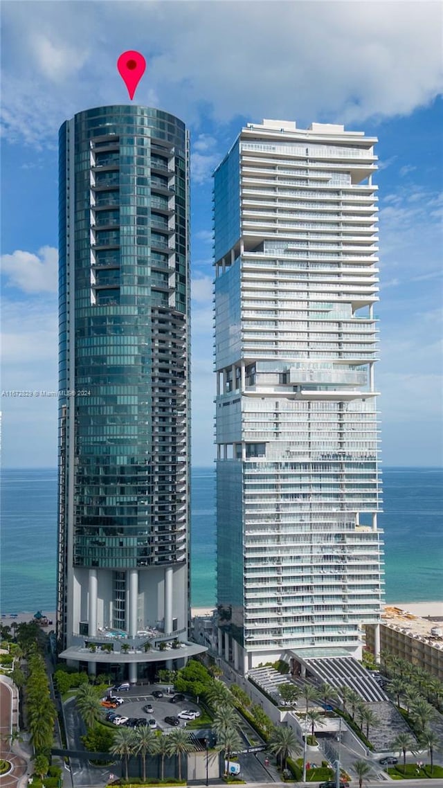 view of building exterior with a water view